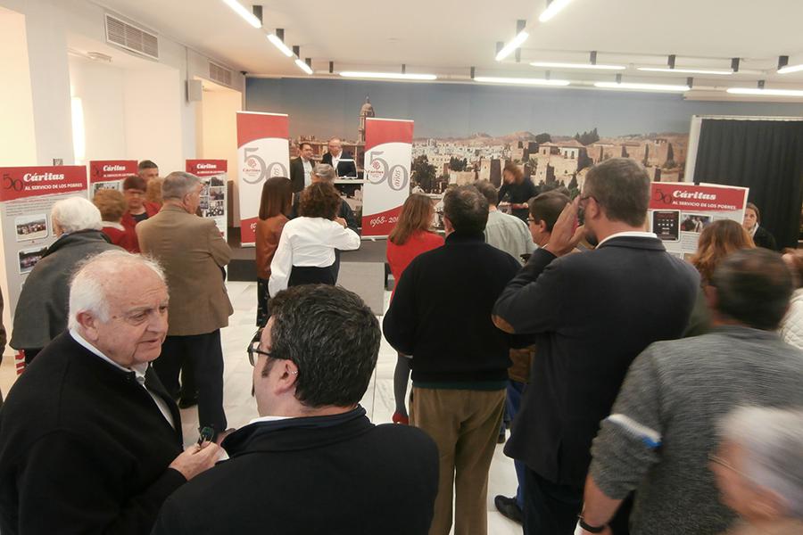 Inauguración de la exposición de Cáritas por su 50 aniversario en la casa hermandad de Estudiantes// CÁRITAS MÁLAGA